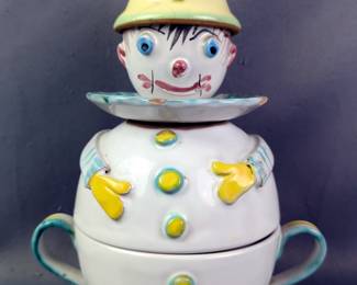 Assorted Kitchen and Home Collection: Vegetable Embossed Dish, Floral Glasses, Quilted Carrier, and Clown Teacup Set