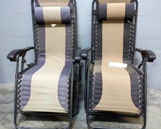 Two Adjustable Zero Gravity Lounge Chairs