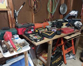 tool boxes, mechanics creeper, battery chargers, Craftsman scroll saw, circular saw, router, trailer balls, floor jack, jack stands