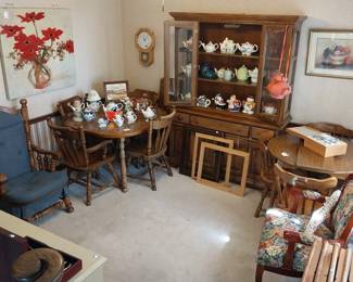 dining table and chairs, china cabinet, tea pots, arm chairs, wall clock