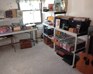 Esteban acoustic electric guitar and amp, Yamaha EZ 150 keyboard, 3 string banjo, dulcimer, books, DVDs, CDs, records, Anheuser Busch wooden case