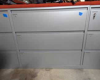 3 file cabinets padded tops and all have keys.