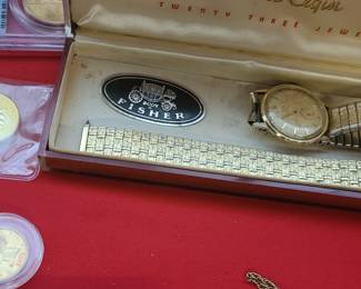Gold Fisher Body retirement watch in original box. Watch is a 23 jewel Lord Elgin in running condition.