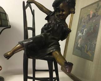 BRONZE GIRL ON CHAIR WITH CAT
