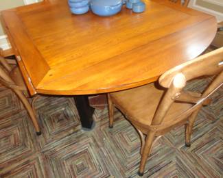 The large round table can also become a smaller square one (think poker/card night)