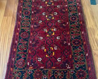 Hand woven Afghan rug
