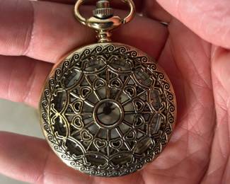 Ornate pocket watch