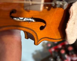 Violin tag says Chicago