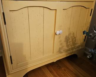 Cute light yellow cabinet