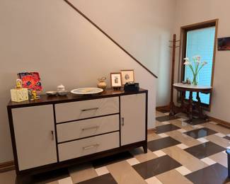 Beautiful dark credenza with ivory linen component/cabinet and door face, purchased from Carter's Furniture.