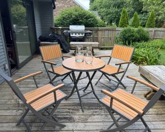 Crate + Barrel patio set. Bistro table, with 4 chairs. Sonoma ceramic brick-lined gas grill with cover (could use a good clean)