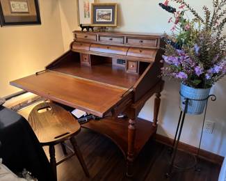Nice piece of furniture! Folds out to desk, also has an electric component . Sturdy, lots of storage