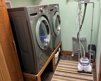 Newer LG washer and electric dryer are for sale! ALSO for sale are the custom wooden stands for the washer and dryer