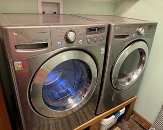 Newer LG washer and electric dryer are for sale! ALSO for sale are the custom wooden stands for the washer and dryer