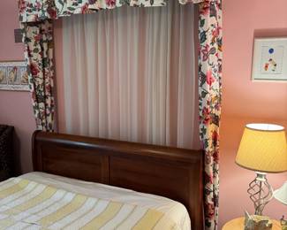 Fabric canopy/valance above bed (attached to wall) is for sale! ( bed is a queen for scale)