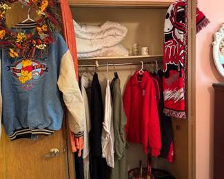 Burberry trench coat, and some of the small collection of Nebraska Huskers items