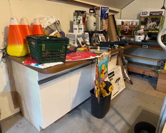 There is some "old" kitchen cabinetry out in garage that is for sale. Large countertop with drawers and cabinets, a tall skinny pantry like cabinet, etc.