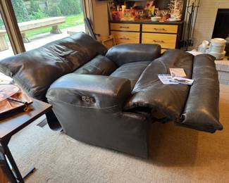 Chocolate brown leather "Catnapper", electric reclining "man and dog" chair. Excellent condition, also dangerously comfortable :) Power headrest also