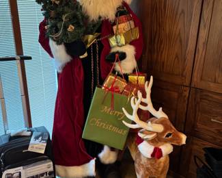 6' Santa purchased from Schnucks Floral- has a great story to it ! Porcelain face, comes with a reindeer too!