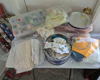 Buttons, thread, felt, hot glue guns, wrapping paper and lace.