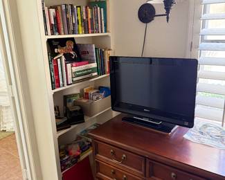 Sligh Office Filing Credenza. Sony TV, Books, Games, Decks of Cards and Wall lamp