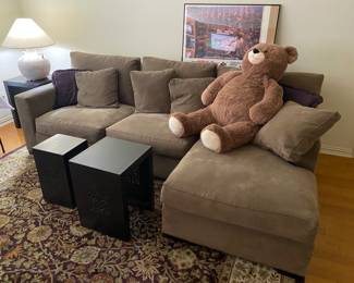 Crate and Barrel sectional sofa, tables, lamp, framed posters, large teddy bear
