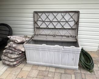 storage box, outdoor cushions, water hose