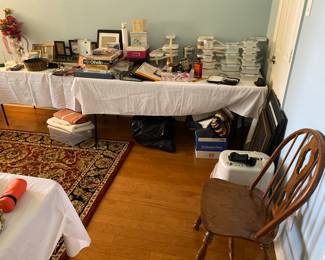 oriental rug. craft table, wood chair