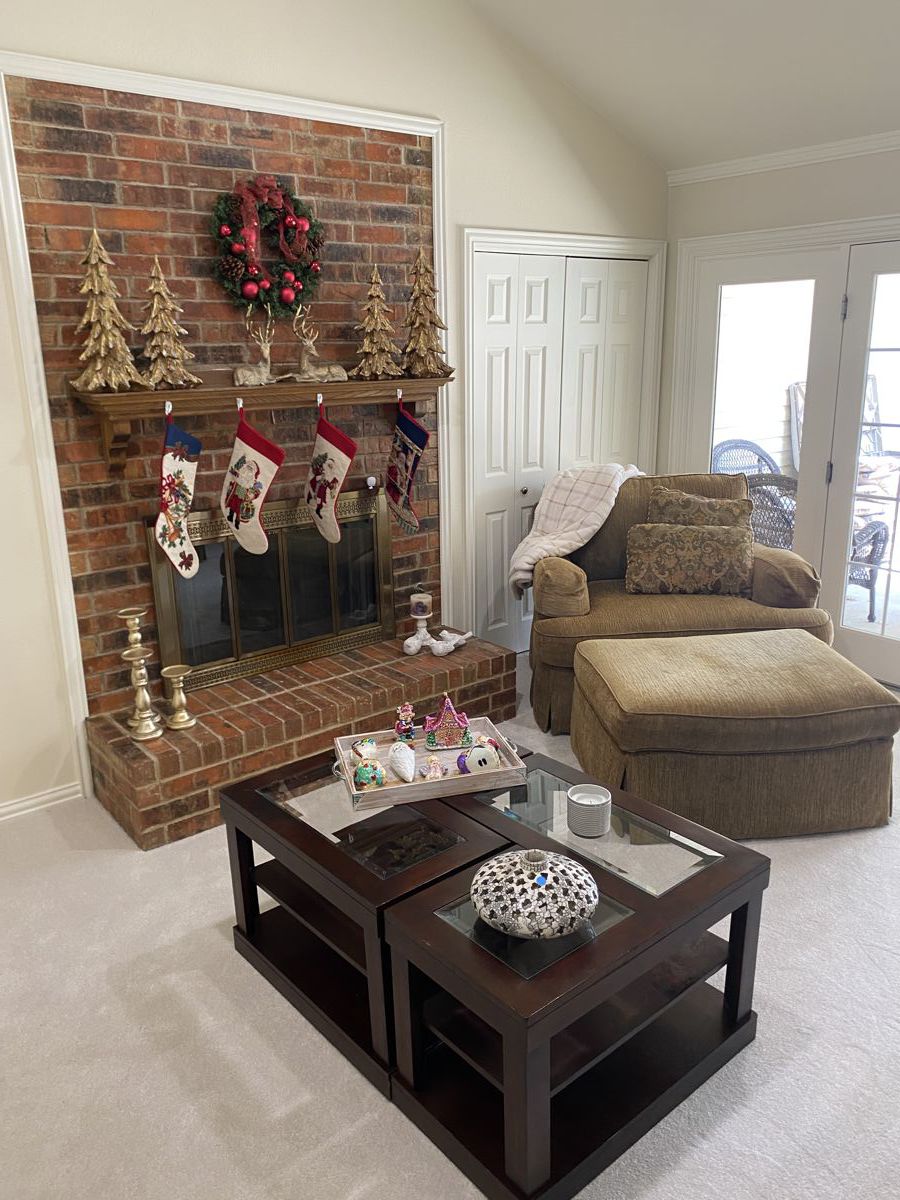 Club chair w ottoman, coffee table, Christmas stockings & decorations