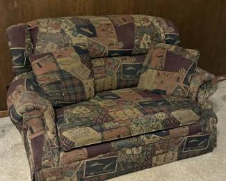 Love seat with hide-a-bed