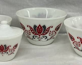 Four Milk Glass Mixing Bowls and Covered Sugar Bowl with Red and Black Floral Design