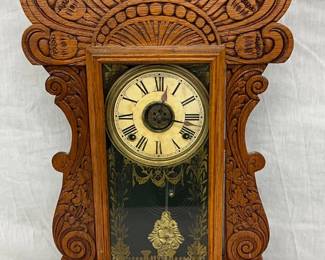 Carved Wood Mantel Clock with Glass Pane and Roman Numeral Dial