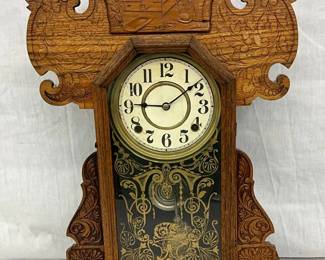 Carved Oak Mantel Clock with Pendulum and Ornate Glass Panel