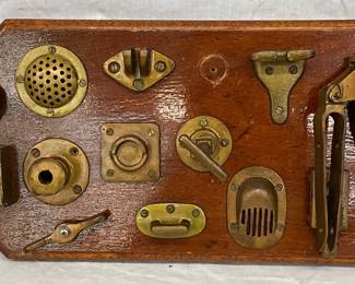 Wall-Mounted Display of Brass Maritime Hardware on Wood Plaque, 20 x 11 Inches