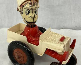 6” x 7” Plastic and Metal Toy Fireman in Truck with Moving Head