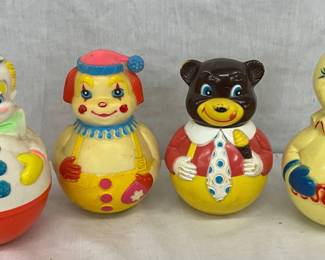 4 Plastic Roly-Poly Toys with Clown and Bear Designs