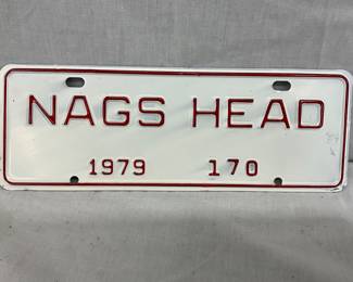 Embossed 1979 Nags Head License Tag with Red Lettering