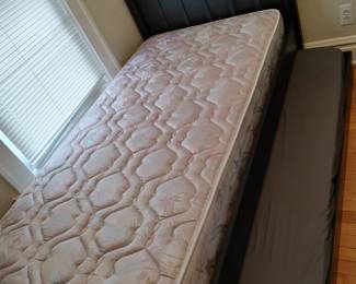 Clean twin mattress goes with trundle bed.