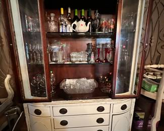 Antique Drexel, China cabinet refinished in off-white, rustic, distressed farmhouse style full of glassware