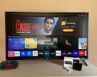LG Smart TV 49 In, Timex Alarm Clock And Apple TV Plug In