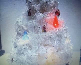 Vintage white tabletop Christmas tree. https://modestlambestatesales.hibid.com/