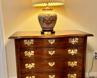 Baker serpentine mahogany chest