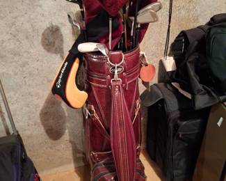 Two sets of golf clubs