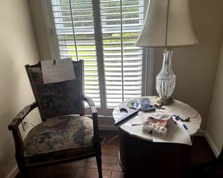 Round table with marble top, lamp, chair