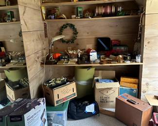 Christmas tins, heating pad, slide projector, ribbon, lamp, file folders,