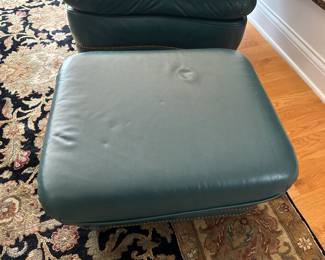 Hancock & Moore green leather armchair (does not recline) and matching ottoman. Chair measures 36"W x 49"D x 35"H and ottoman 27" x 21" x 14"H