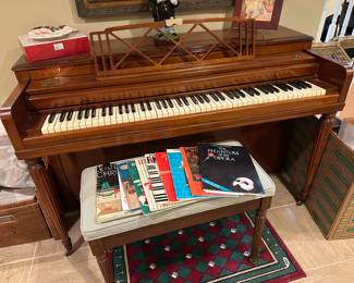 Upright piano and bench