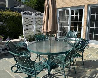 55" diameter patio table, chairs and umbrella