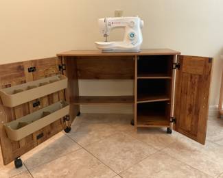 Sewing cabinet opened up.