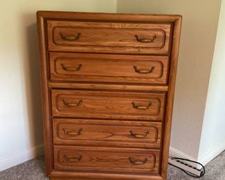 Chest of drawers. Height 53 inches, depth 18 inches, width 38 inches.